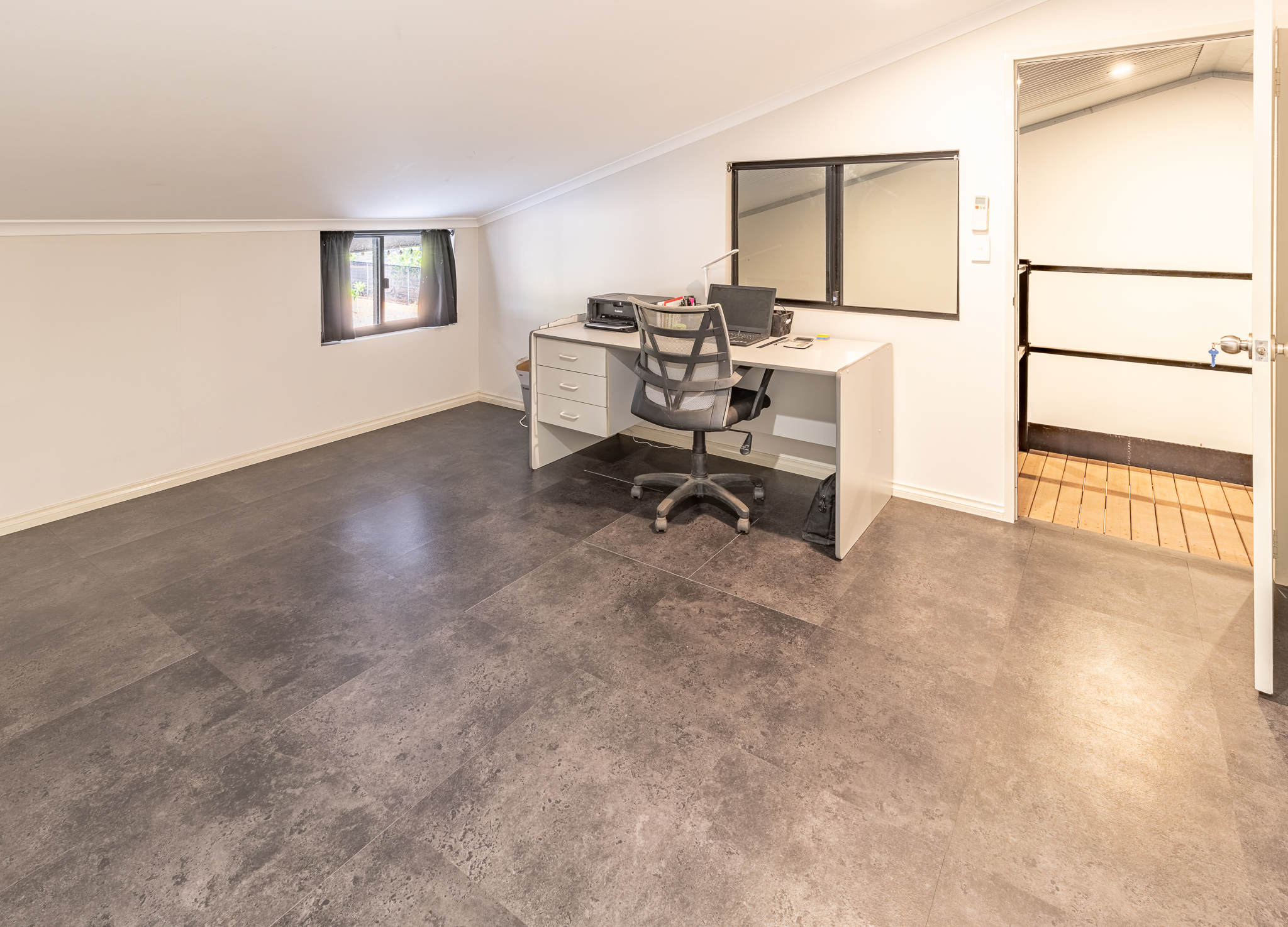 Unique Industrial Opportunity with Modern Caretaker Living!