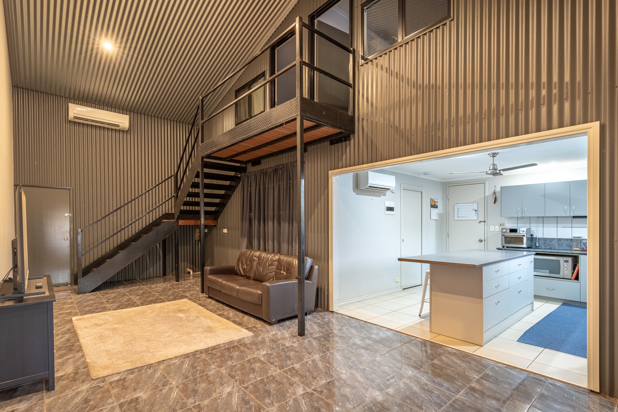 Unique Industrial Opportunity with Modern Caretaker Living!