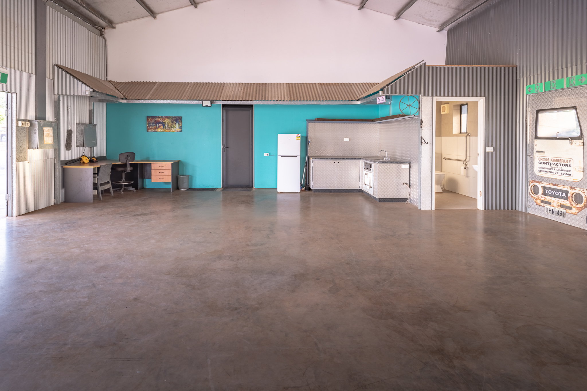 Unique Industrial Opportunity with Modern Caretaker Living!