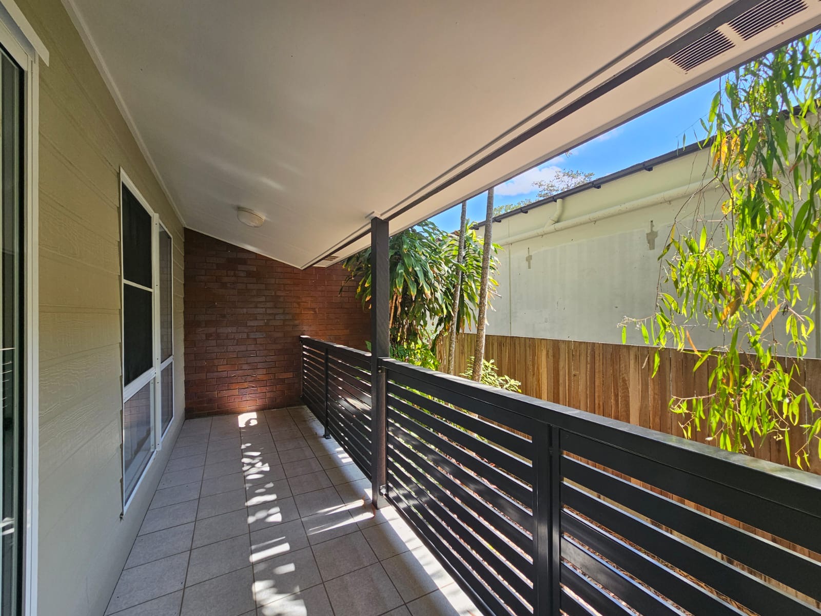 Modern Coastal Townhouse in Resort-Style Complex  Comfort Resort Blue Pacific