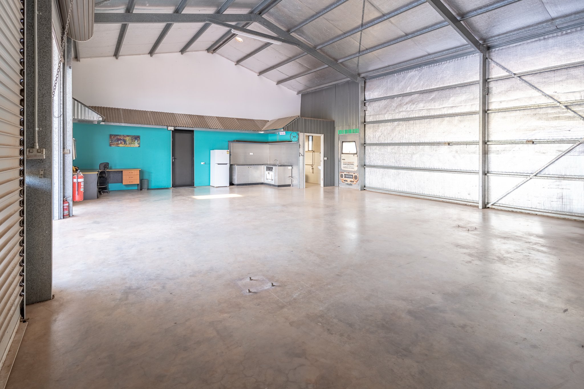 Unique Industrial Opportunity with Modern Caretaker Living!