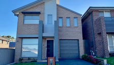Property at 12 Albermarle Road, Glenfield, NSW 2167