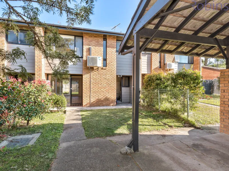 Three bedroom, air conditioned townhouse in quiet street. Pets considered!