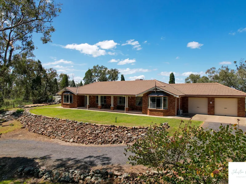 SECLUDED FAMILY HOME ON 10 ACRES