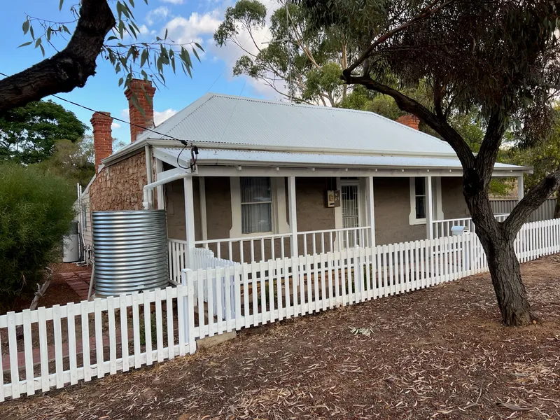 One of a kind Stone cottage on big block with nice views
