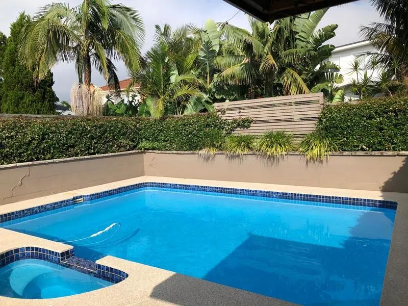 Lovely Three Bedroom Home Just Moments Away From the Sandy Beaches! Utilities Included