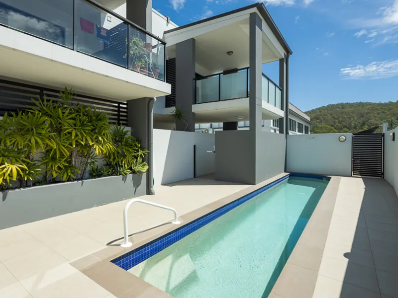 SECURE LOW MAINTENANCE LIVING AT IT'S BEST - WITH POOL & GYMNASIUM