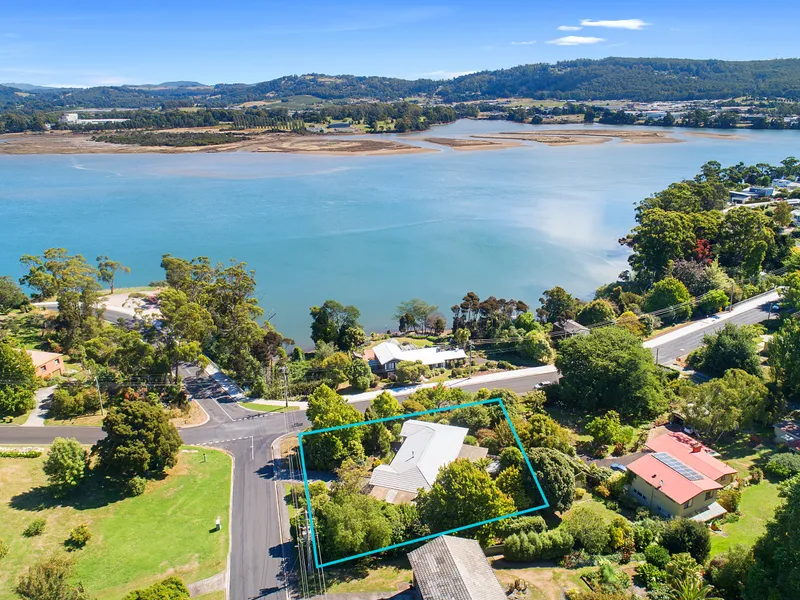 River and walk ways mere metres away.