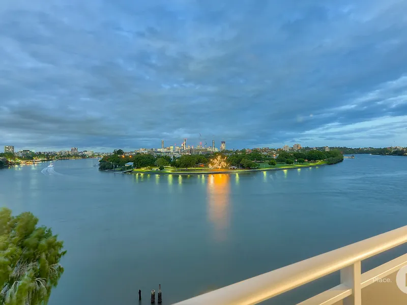 Panoramic river and city views – prime riverfront position