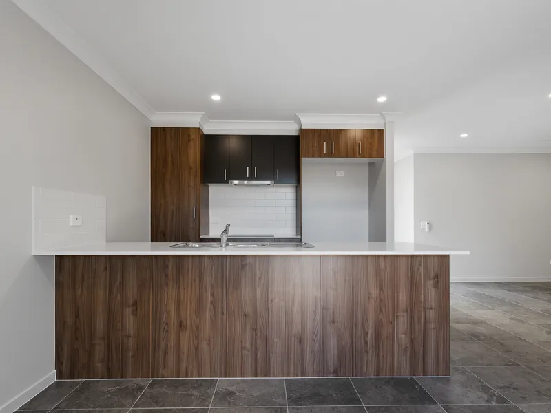 Welcome to your dream three-bedroom terrace home in Yarrabilba