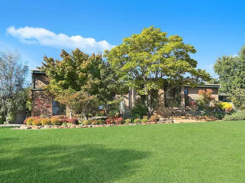 A Contemporary Architectural Family Entertainer Overlooking Park Like Grounds 
