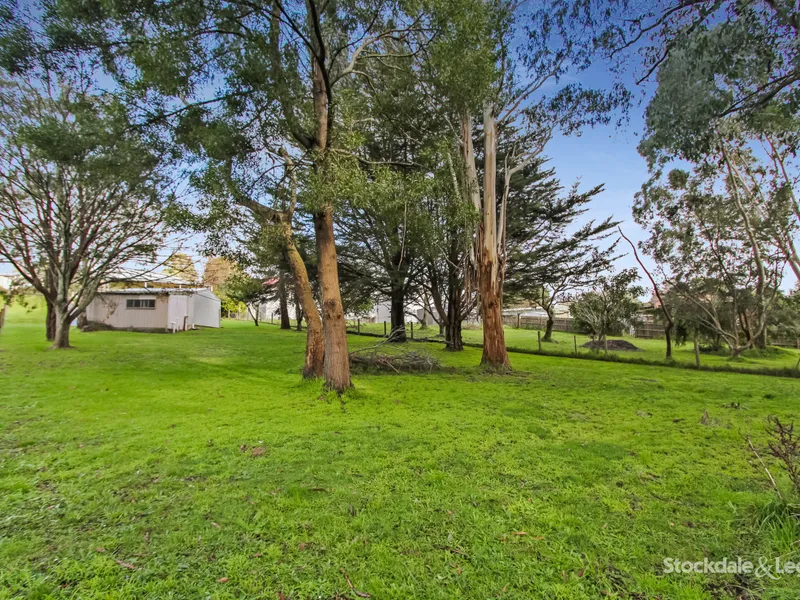 GREAT SIZE HOME ON LARGE BLOCK IN TOWN