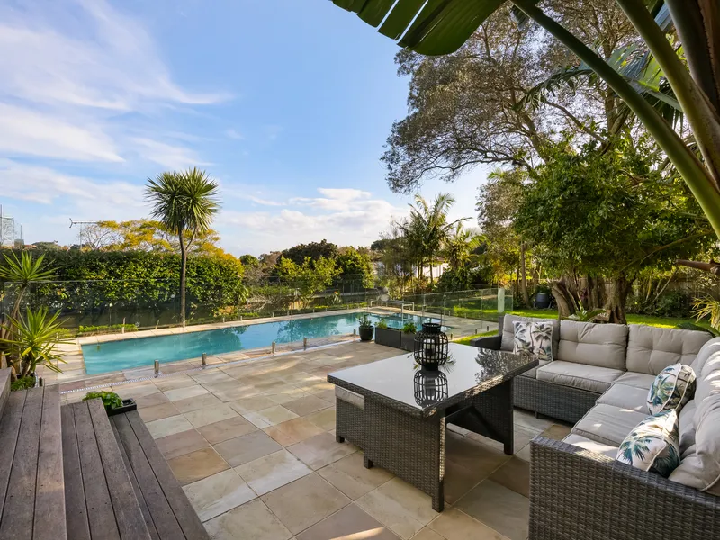A Entertainers Family Haven On 689sqm With A Lush Garden Paradise And District Views