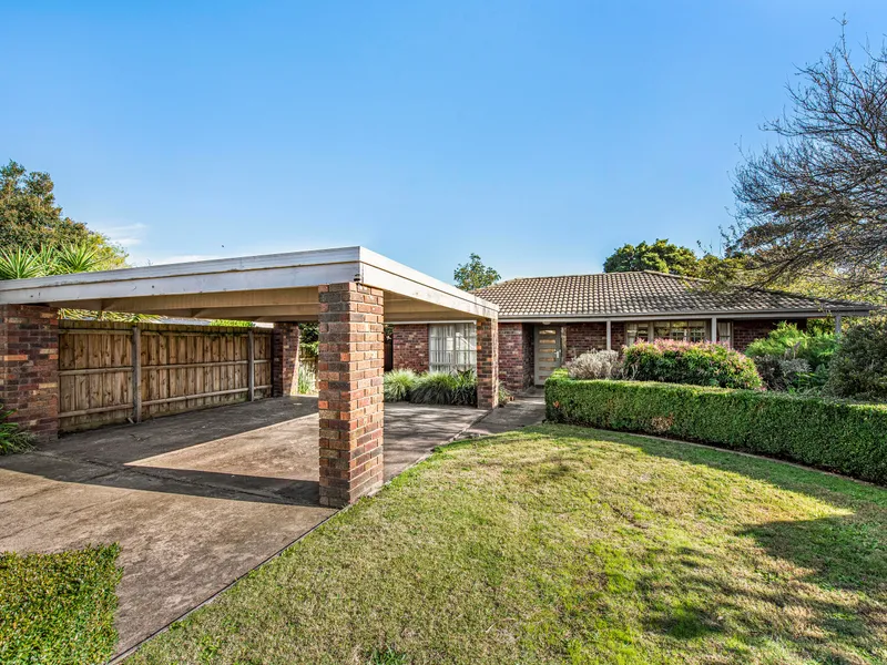A Beautiful Brick Home with Landscaped Gardens