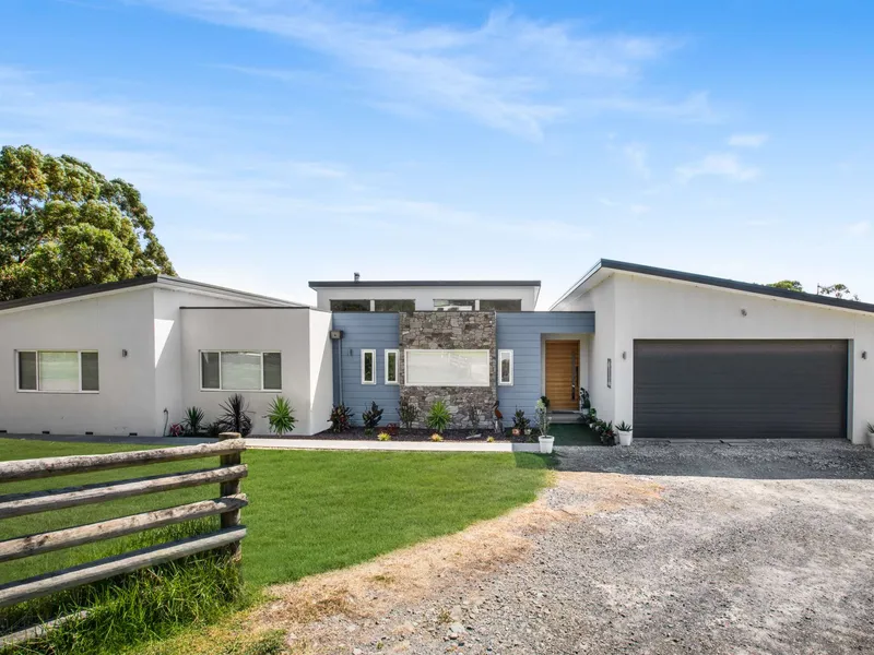 STUNNING DESIGNER HOME ON 5 ACRES WITH WESTERN PORT BAY VIEWS!