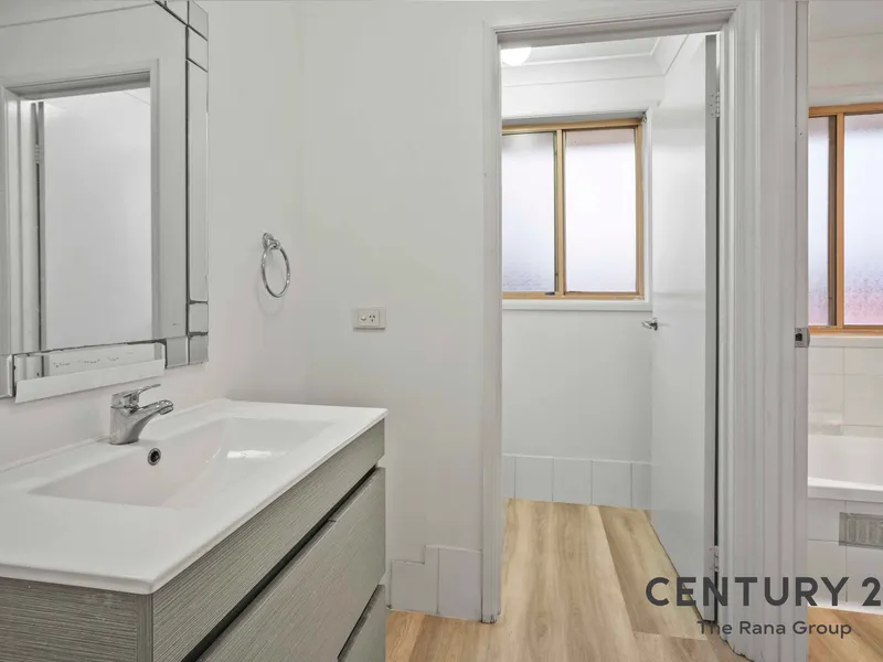 Refreshed and Rejuvenated Home - Walking Distance to Shopping and Lake!