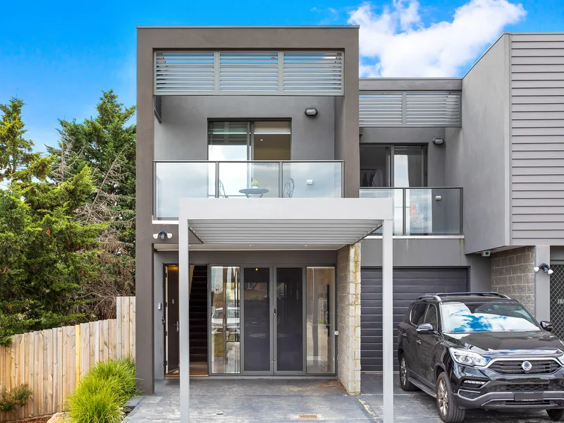 Impeccably Designed Townhouse with City Views...