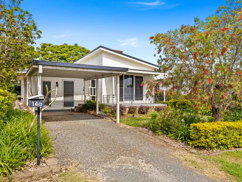 Your own garden oasis, with a cute house too!