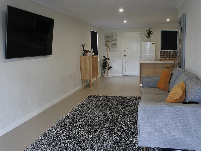 HUGE BALCONY WITH LAKE VIEWS + 2 CARPORTS