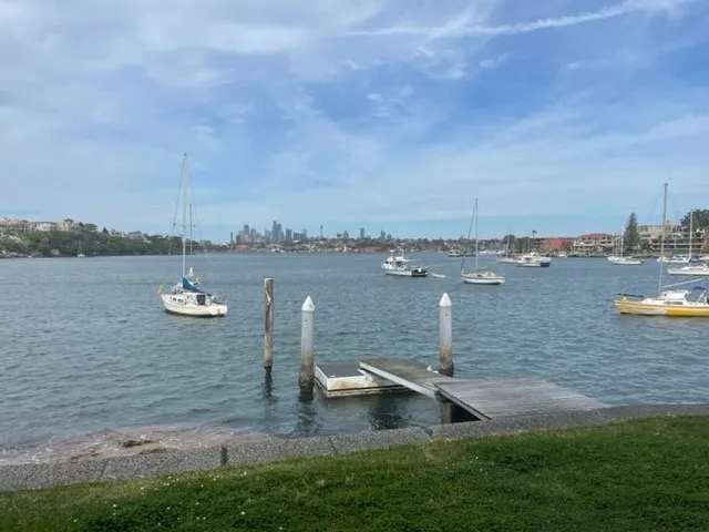 Waterfront with harbour and city views