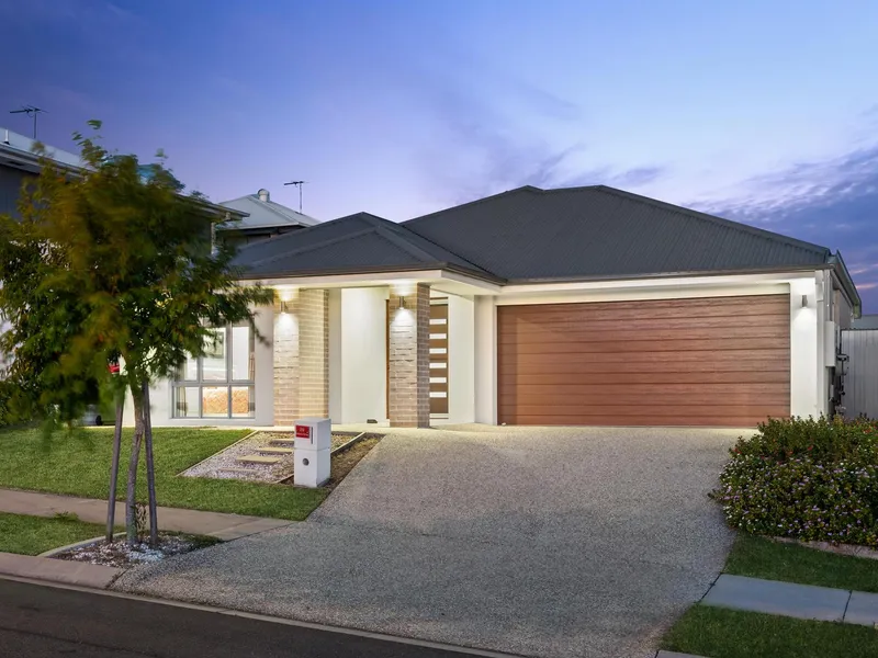 Exceptional Metricon Home Just Steps from School - Luxurious Living with Modern Comforts!