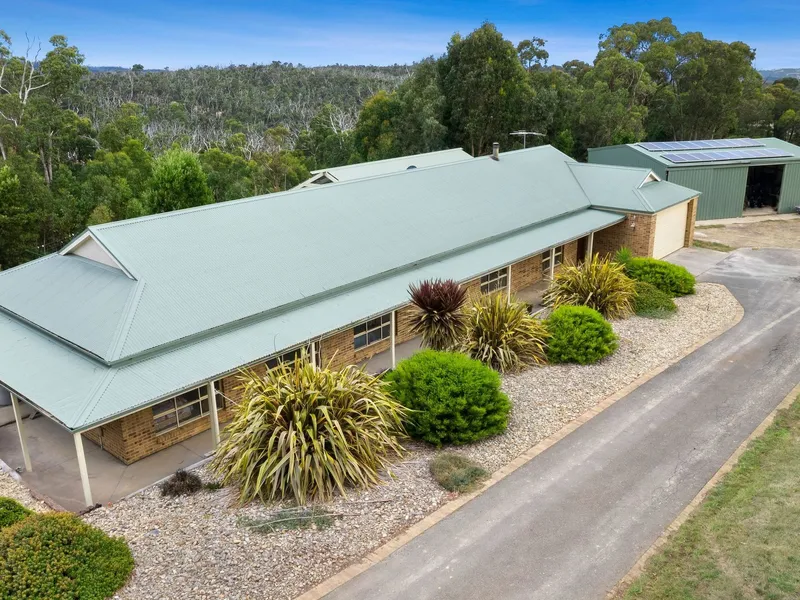 Outstanding family acreage in a secluded country setting