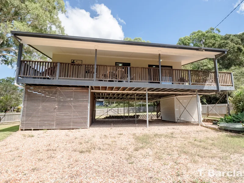 High Set Steel Frame Home with Water Views and Ample Covered Parking