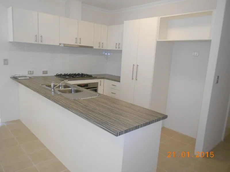 GET IN QUICK FOR THIS LOW MAINTENANCE VILLA!