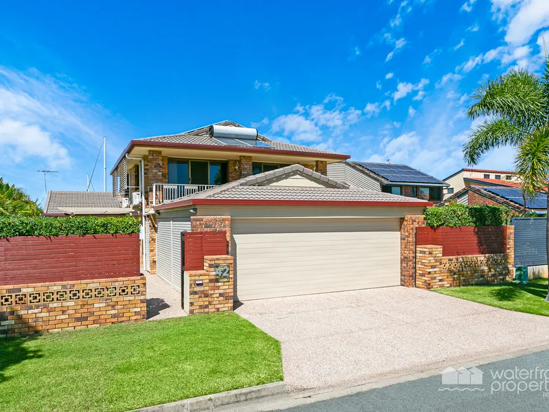 Furnished Canal Home in high mast area, Awaits Your Inspection!