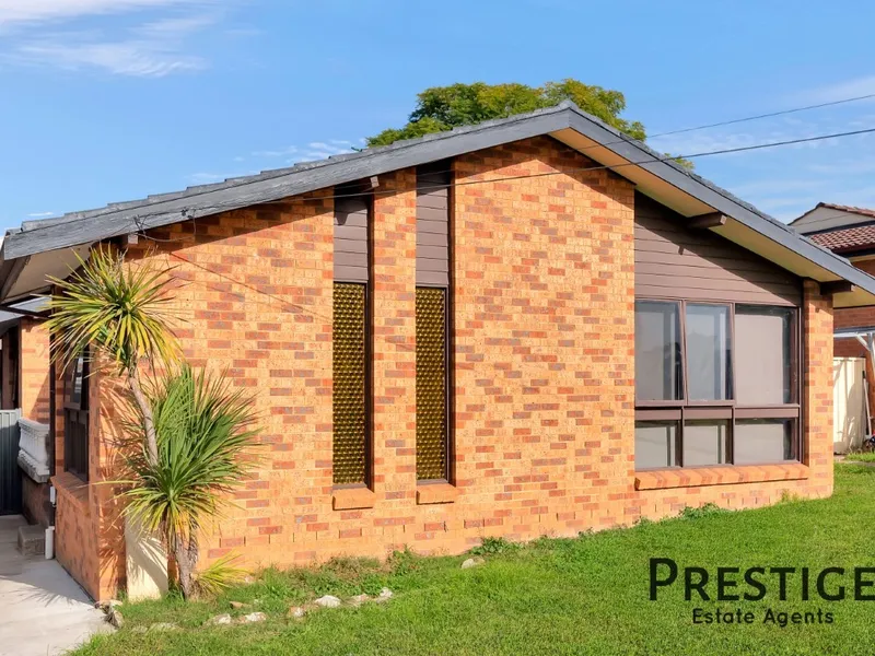 RECENTLY RENOVATED BRICK VENEER HOME.