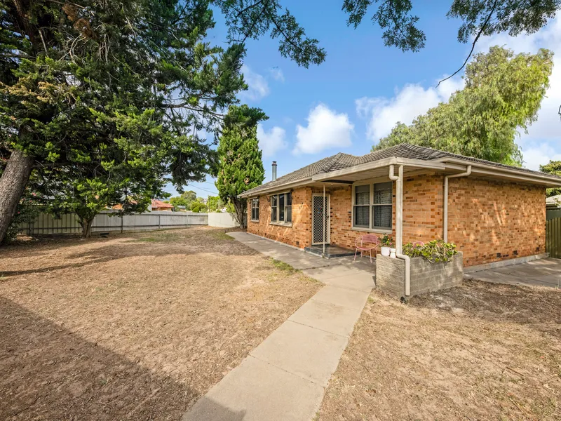 Solid Brick Home on Generous Corner Allotment