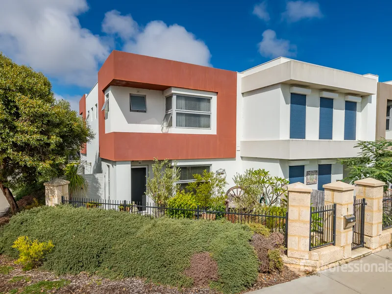 STUNNING TWO STORY TOWNHOUSE.