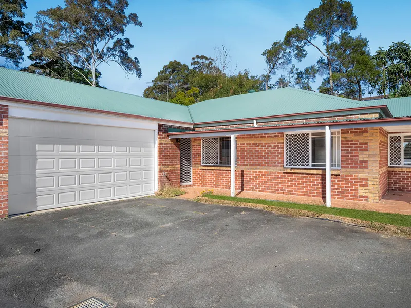 Low maintenance, ideally located!