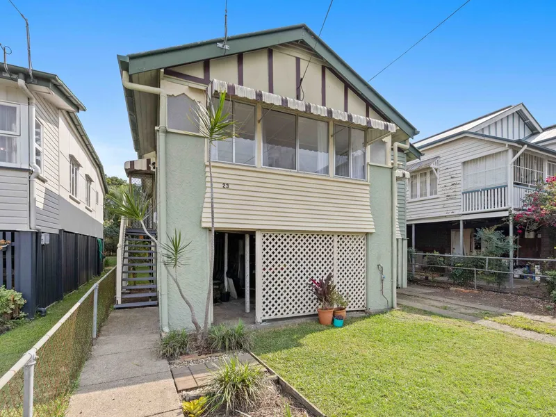 Ready-made retreat with scenic green outlooks & golden potential