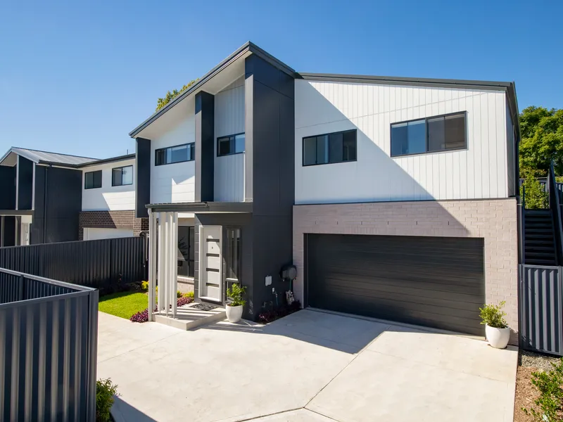 Near new freestanding townhome with luxury finishes throughout