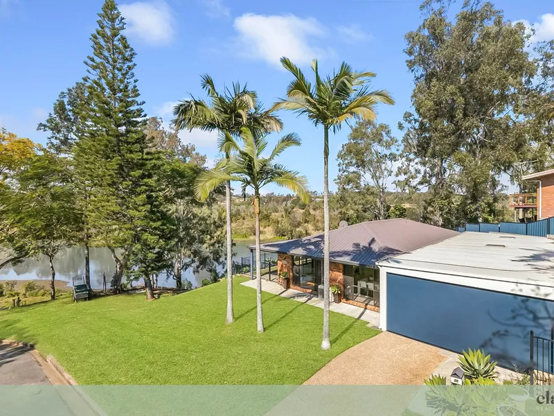 A Rare Opportunity to Secure a Renovated Riverfront Stunner