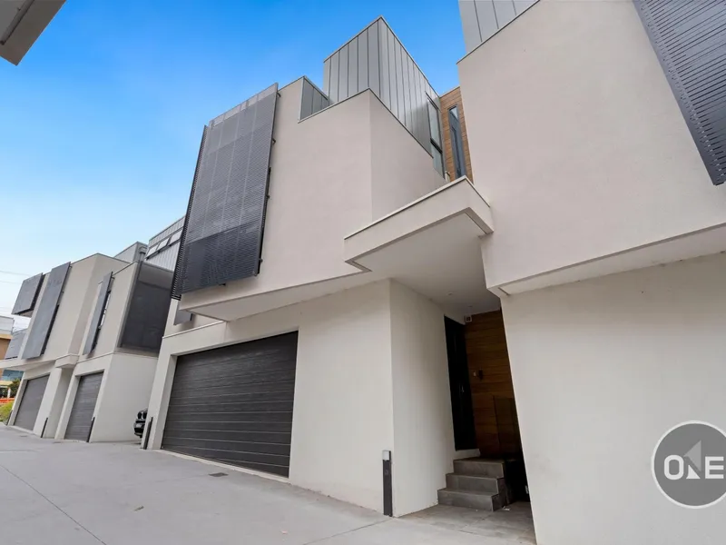 Terrific Tri-Level Townhouse with Private Lift!