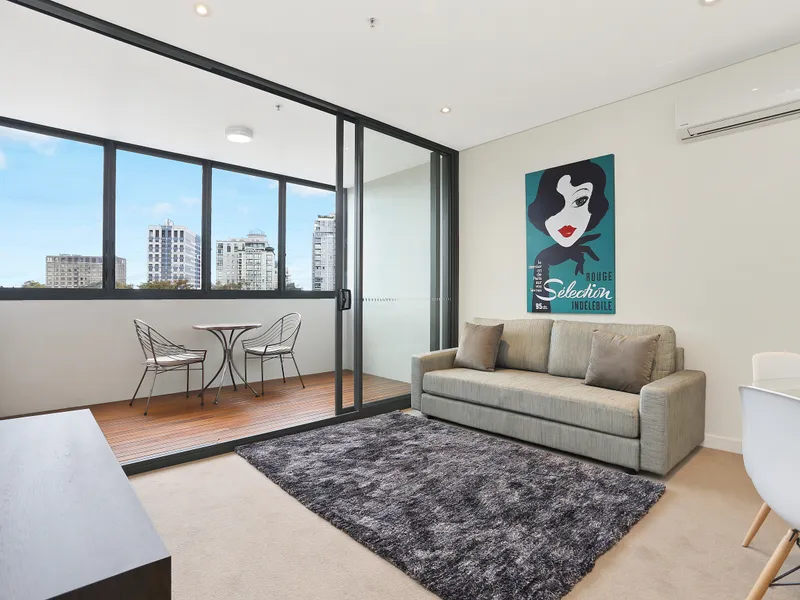 A Modern Furnished Apartment With An Enclosed Balcony Overlooking North Sydney