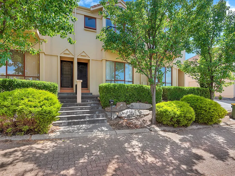 Attractive Townhouse Set on 2 Levels with Delightful Views