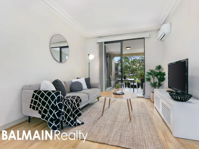 Modern Apartment in a Great Lifestyle Location with Timber Flooring, Air-Conditioning, Secure Lock-Up Garage & Access to Resort Style Amenities