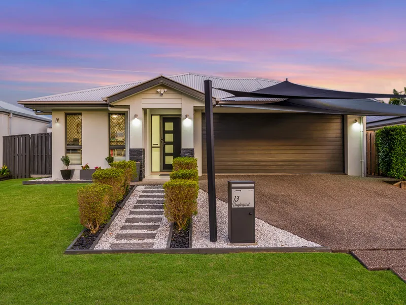 LOW-MAINTENANCE APPEAL WITH FANTASTIC OUTDOOR LIVING