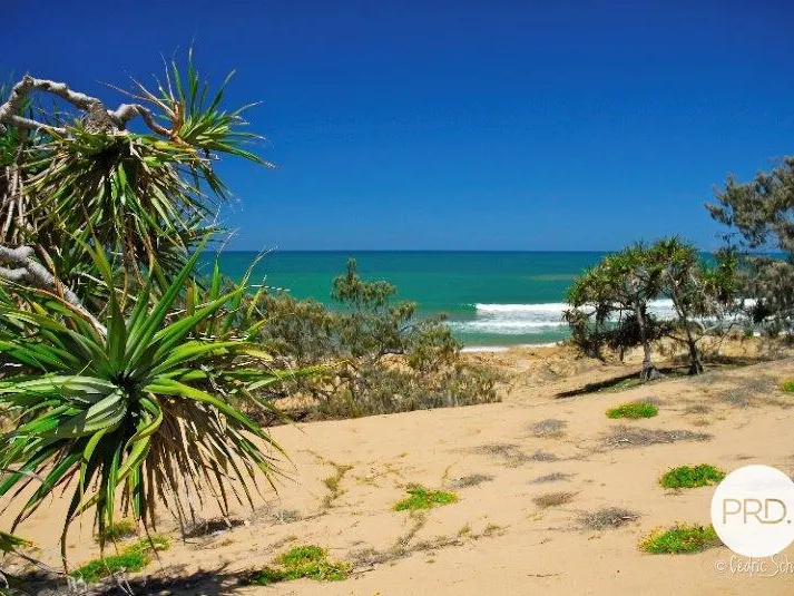 Absolute Beach Front.          Just under half an acre!