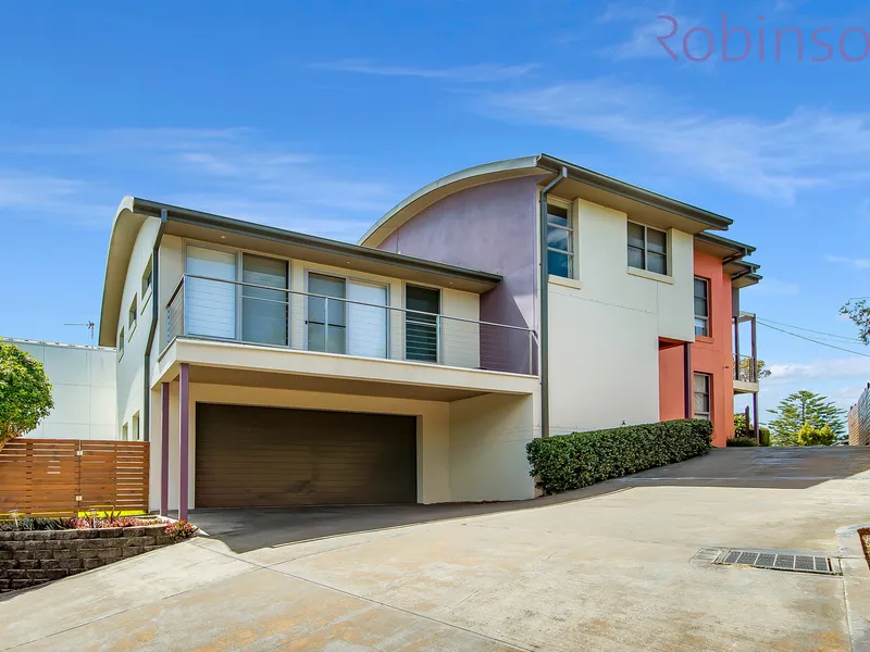 Immaculate split-level residence in private sought after Merewether location