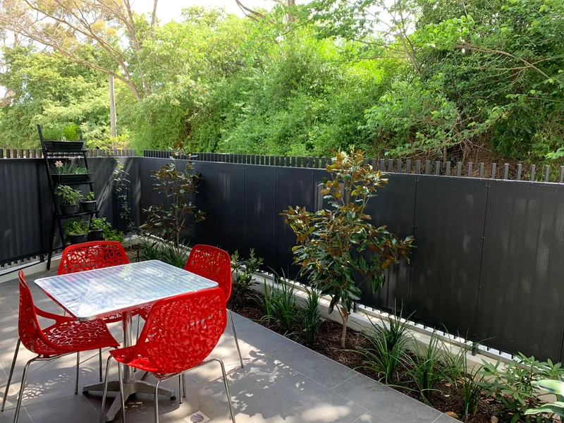 “Large ground level apartment with two courtyards!”