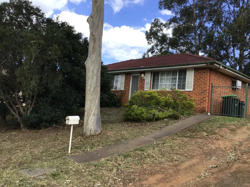 FRESHLY PAINTED THREE BEDROOM HOME