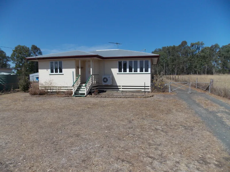 COUNTRY LIVING AT IT'S BEST, ON 1/2 ACRE BLOCK