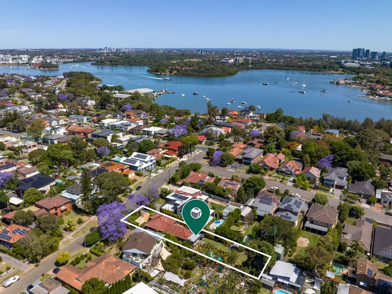 Flawless 954m2 family entertainer basks in a private, picturesque garden setting