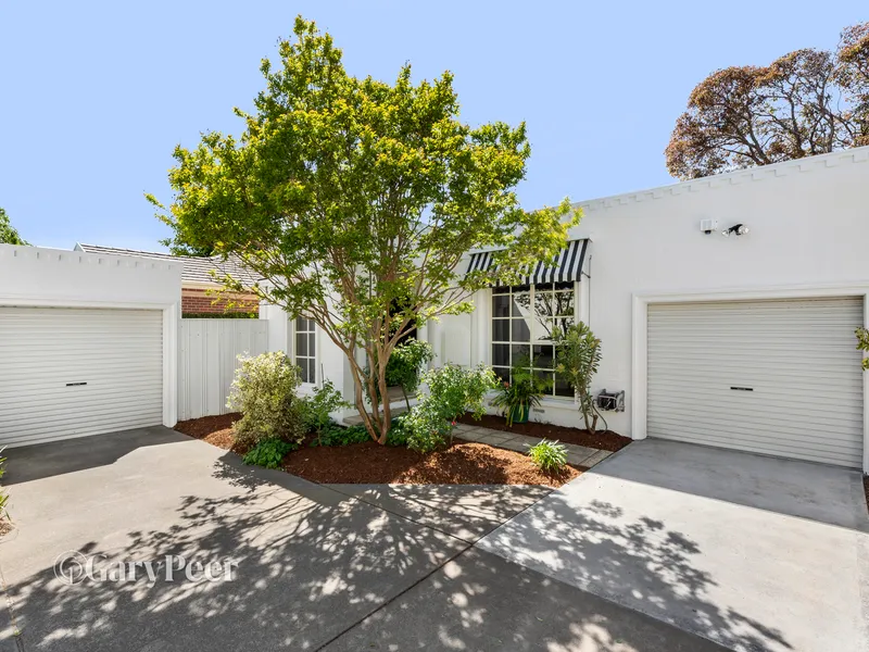 Brilliantly located single level living with two courtyards!