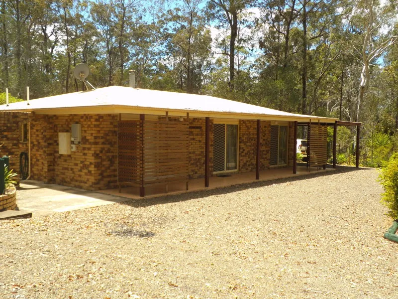 LOW SET BRICK HOUSE on 5 acres