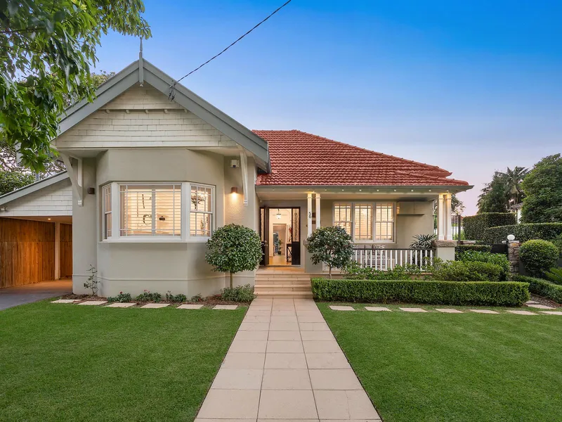 Spacious modern grandeur in manicured garden setting